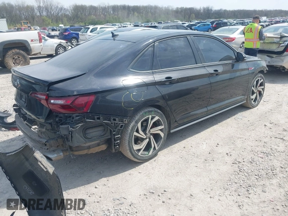 2023 Volkswagen Jetta GLI Autobahn z VIN 3VW2T7BU2PM054137, wystawiony jako IAAI lot #42029063 z przebiegiem 17 456 mil mil oraz . Historia ofert i sprzedaży dostępna na DreamBid. Obrazek 4.
