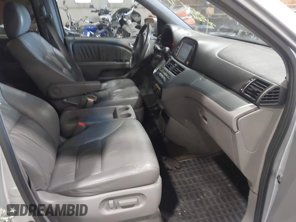 2010 Honda Odyssey EX-L z VIN 5FNRL3H75AB009698, wystawiony jako IAAI lot #42855966 z przebiegiem 215 138 mil mil oraz . Historia ofert i sprzedaży dostępna na DreamBid. Obrazek 5.