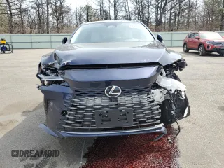 2024 Lexus RX 450h+ Luxury with VIN JTJCJMGA5R2022672, listed as a Copart auction lot 53726055 with 3,963 mi miles and Salvage title. Bid and sale history available at DreamBid. Image 5.