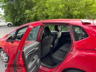 2015 Honda Fit LX with VIN 3HGGK5H50FM760104, listed as a Copart auction lot 63164915 with 118,328 mi miles and Clean title. Bid and sale history available at DreamBid. Image 6.