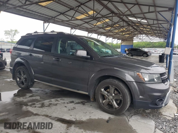 2015 Dodge Journey Crossroad with VIN 3C4PDCGB0FT713892, listed as a Copart auction lot 51682815 with 147,694 mi miles and Salvage title. Bid and sale history available at DreamBid. Image 4.
