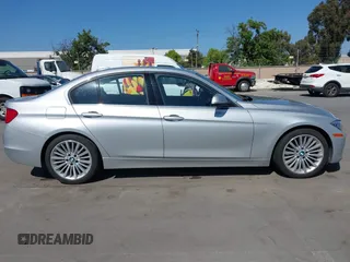 2014 BMW 3 Series 328i z VIN WBA3C1C52EK108811, wystawiony jako IAAI lot #42213041 z przebiegiem 65 634 mil mil oraz . Historia ofert i sprzedaży dostępna na DreamBid. Obrazek 13.