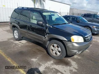 2004 Mazda Tribute LX with VIN 4F2CZ941X4KM29568, listed as a IAAI auction lot 41735353 with 285,989 mi miles. Bid and sale history available at carsss.com. Image 1.
