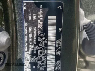 2020 Lexus RX 450h with VIN 2T2HGMDA3LC046646, listed as a Copart auction lot 61030015 with 74,709 mi miles and Salvage title. Bid and sale history available at DreamBid. Image 13.