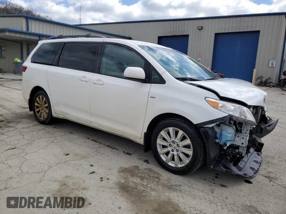 2016 Toyota Sienna LE with VIN 5TDJK3DC3GS131175, listed as a Copart auction lot 52520595 with 107,001 mi miles and Salvage Title. Bid and sale history available at carsss.com. Image 4.