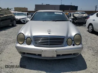 2002 Mercedes-Benz CLK 320/430 z VIN WDBLJ70G92T119391, wystawiony jako Copart lot #58616445 z przebiegiem 134 501 mil mil oraz Szkoda całkowita • Salvage title. Historia ofert i sprzedaży dostępna na DreamBid. Obrazek 5.