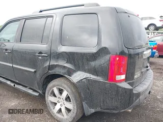 2012 Honda Pilot Touring z VIN 5FNYF4H92CB074778, wystawiony jako IAAI lot #42267913 z przebiegiem 138 362 mil mil oraz . Historia ofert i sprzedaży dostępna na DreamBid. Obrazek 6.
