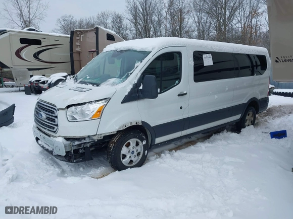 2018 Ford Transit Wagon XL with VIN 1FBZX2ZG2JKB04207, listed as a IAAI auction lot 41440996 with 126,256 mi miles. Bid and sale history available at carsss.com. Image 2.