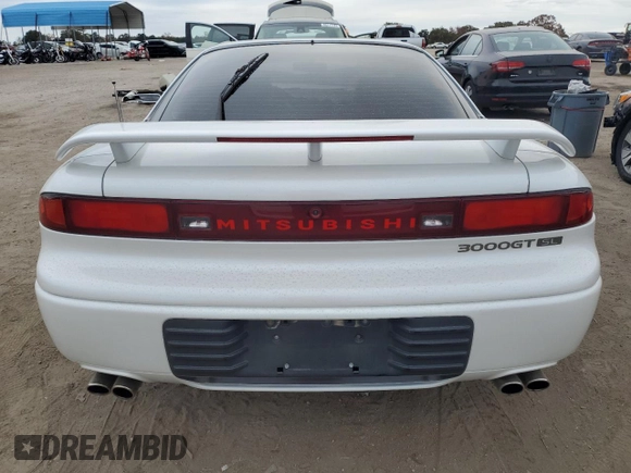 1991 Mitsubishi 3000GT z VIN JA3XD64B1MY029305, wystawiony jako Copart lot #83097074 z przebiegiem 73 264 mil mil oraz Szkoda całkowita • Salvage title. Historia ofert i sprzedaży dostępna na DreamBid. Obrazek 6.