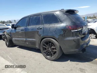 2018 Jeep Grand Cherokee Trackhawk z VIN 1C4RJFN90JC293820, wystawiony jako Copart lot #63778505 z przebiegiem 87 682 mil mil oraz Szkoda całkowita • Salvage title. Historia ofert i sprzedaży dostępna na DreamBid. Obrazek 2.