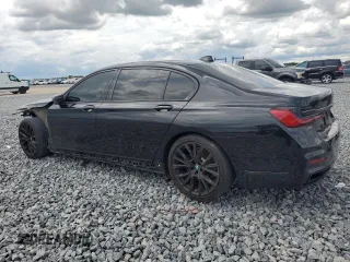 2021 BMW 7 Series 740i with VIN WBA7T2C01MCF78660, listed as a Copart auction lot 59582205 with 51,868 mi miles and Salvage title. Bid and sale history available at DreamBid. Image 2.