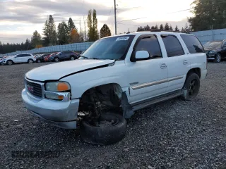2002 GMC Yukon SLT z VIN 1GKEK13Z72J277326, wystawiony jako Copart lot #79569964 z przebiegiem 300 480 mil mil oraz Szkoda całkowita • Salvage title. Historia ofert i sprzedaży dostępna na DreamBid. Obrazek 1.