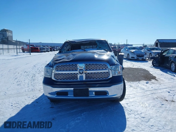 2020 Ram 1500 SLT z VIN 1C6RR7TTXLS100635, wystawiony jako IAAI lot #41314107 z przebiegiem 56 913 mil mil oraz . Historia ofert i sprzedaży dostępna na DreamBid. Obrazek 12.
