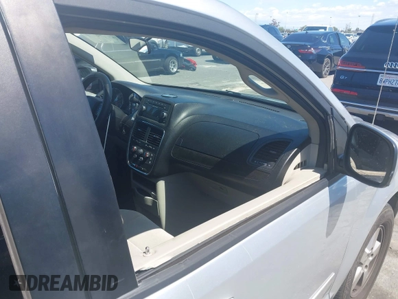 2012 Dodge Grand Caravan SXT with VIN 2C4RDGCG7CR204835, listed as a IAAI auction lot 41948688 with 125,466 mi miles and . Bid and sale history available at DreamBid. Image 6.