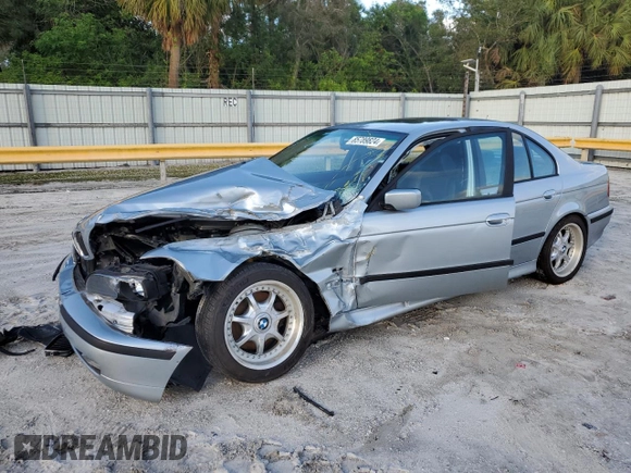 1998 BMW 5 Series 540i with VIN WBADE5327WBV93735, listed as a Copart auction lot 85789824 with 377,552 mi miles and Salvage Title. Bid and sale history available at DreamBid. Image 1.