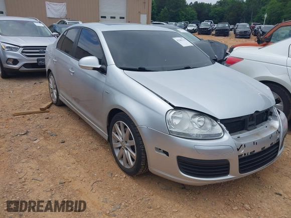 2010 Volkswagen Jetta Wolfsburg Edition z VIN 3VWRJ7AJ1AM024548, wystawiony jako IAAI lot #42281115 z przebiegiem 163 666 mil mil oraz . Historia ofert i sprzedaży dostępna na DreamBid. Obrazek 1.