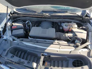 2023 Chevrolet Tahoe LS with VIN 1GNSCMKD7PR407530, listed as a Copart auction lot 73616884 with 11,871 mi miles and Salvage title. Bid and sale history available at DreamBid. Image 13.