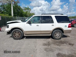 2014 Ford Expedition King Ranch with VIN 1FMJU1J50EEF14445, listed as a IAAI auction lot 42571073 with 125,174 mi miles and . Bid and sale history available at DreamBid. Image 14.