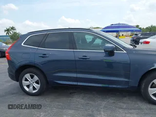 2022 Volvo XC60 Momentum z VIN YV4L12RKXN1052826, wystawiony jako IAAI lot #41869228 z przebiegiem 30 044 mil mil oraz . Historia ofert i sprzedaży dostępna na DreamBid. Obrazek 14.