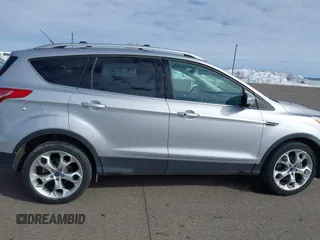 2015 Ford Escape Titanium with VIN 1FMCU9J97FUA05003, listed as a IAAI auction lot 41721214 with 51,644 mi miles. Bid and sale history available at carsss.com. Image 13.