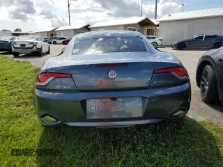2012 Fisker Karma EcoSport z VIN YH4K14AA3CA001524, wystawiony jako Copart lot #74501534 z przebiegiem 15 969 mil mil oraz Nie do naprawy. Historia ofert i sprzedaży dostępna na DreamBid. Obrazek 6.