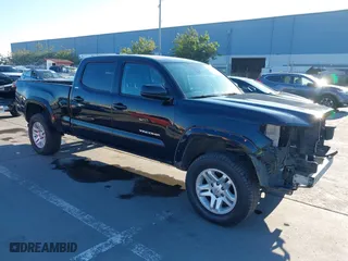 2019 Toyota Tacoma 4WD SR5 with VIN 3TMDZ5BN5KM074429, listed as a IAAI auction lot 41409891 with 55,694 mi miles. Bid and sale history available at carsss.com. Image 1.