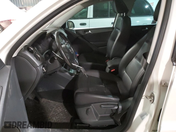 2012 Volkswagen Tiguan SE with VIN WVGAV7AX8CW533592, listed as a Copart auction lot 43246395 with 149,928 mi miles and Salvage Title. Bid and sale history available at DreamBid. Image 7.