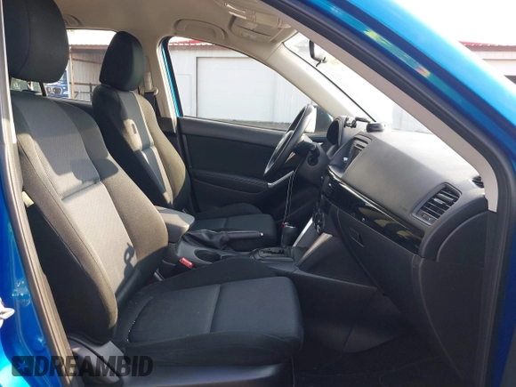 2014 Mazda CX-5 Sport z VIN JM3KE4BE7E0351982, wystawiony jako IAAI lot #42767499 z przebiegiem 154 774 mil mil oraz . Historia ofert i sprzedaży dostępna na DreamBid. Obrazek 5.