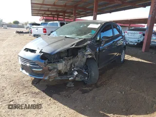 2019 Ford Fiesta SE with VIN 3FADP4EJ8KM101816, listed as a IAAI auction lot 41615459 with 71,028 mi miles. Bid and sale history available at carsss.com. Image 2.
