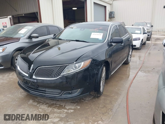 2013 Lincoln MKS EcoBoost with VIN 1LNHL9FT2DG604724, listed as a IAAI auction lot 41428420 with 152,880 mi miles and . Bid and sale history available at DreamBid. Image 2.