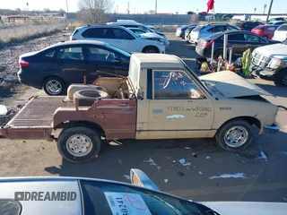 1984 Datsun 720 z VIN JN6ND01S9EW022655, wystawiony jako IAAI lot #41364439 z przebiegiem 242 833 mil mil oraz . Historia ofert i sprzedaży dostępna na DreamBid. Obrazek 12.