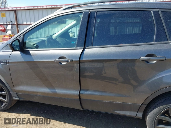 2017 Ford Escape SE with VIN 1FMCU9G94HUE80554, listed as a IAAI auction lot 42039491 with 57,145 mi miles. Bid and sale history available at carsss.com. Image 14.