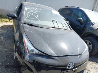 2016 Toyota Prius Two z VIN JTDKBRFU5G3014163, wystawiony jako IAAI lot #42475556 z przebiegiem 157 873 mil mil oraz . Historia ofert i sprzedaży dostępna na DreamBid. Obrazek 12.