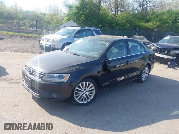 2013 Volkswagen Jetta TDI w/Premium with VIN 3VWLL7AJ5DM390579, listed as a IAAI auction lot 42112031 with 134,995 mi miles and . Bid and sale history available at DreamBid. Image 2.