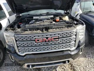2020 GMC Sierra 3500HD Denali z VIN 1GT49WEY6LF219913, wystawiony jako Copart lot #81090434 z przebiegiem 87 356 mil mil oraz Czysty tytuł • Clean title. Historia ofert i sprzedaży dostępna na DreamBid. Obrazek 11.