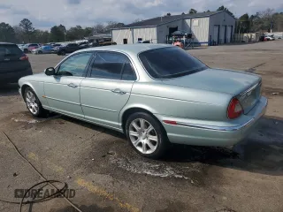 2004 Jaguar XJ with VIN SAJWA71C94SG24466, listed as a Copart auction lot 46610995 with 173,570 mi miles and Salvage Title. Bid and sale history available at carsss.com. Image 2.