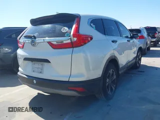 2018 Honda CR-V LX with VIN 2HKRW5H31JH408187, listed as a IAAI auction lot 41623448 with 177,661 mi miles and . Bid and sale history available at DreamBid. Image 4.