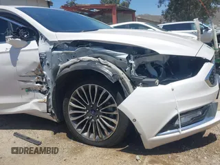 2017 Ford Fusion Titanium z VIN 3FA6P0SU0HR329224, wystawiony jako IAAI lot #42291605 z przebiegiem 176 728 mil mil oraz . Historia ofert i sprzedaży dostępna na DreamBid. Obrazek 18.