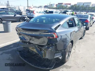 2024 Tesla Model 3 with VIN 5YJ3E1EA7RF717855, listed as a IAAI auction lot 41838814 with 8,750 mi miles and . Bid and sale history available at DreamBid. Image 6.