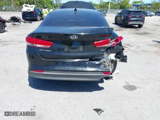 2017 Kia Optima EX with VIN 5XXGU4L35HG142807, listed as a IAAI auction lot 41856251 with 104,634 mi miles. Bid and sale history available at carsss.com. Image 6.