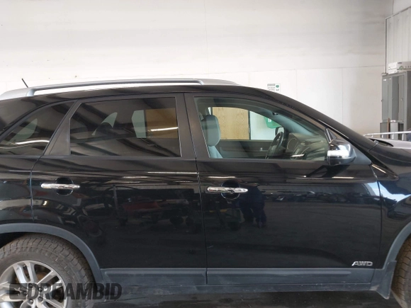 2014 Kia Sorento LX with VIN 5XYKTCA64EG541574, listed as a IAAI auction lot 42067910 with 144,234 mi miles and . Bid and sale history available at carsss.com. Image 13.