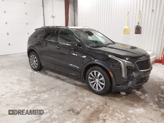 2020 Cadillac XT4 AWD Sport with VIN 1GYFZFR43LF090264, listed as a IAAI auction lot 41261586 with 65,859 mi miles and . Bid and sale history available at carsss.com. Image 1.
