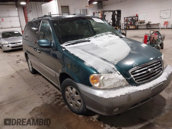 2003 Kia Sedona LX with VIN KNDUP131336390410, listed as a IAAI auction lot 41602426 with 170,613 mi miles. Bid and sale history available at carsss.com. Image 1.