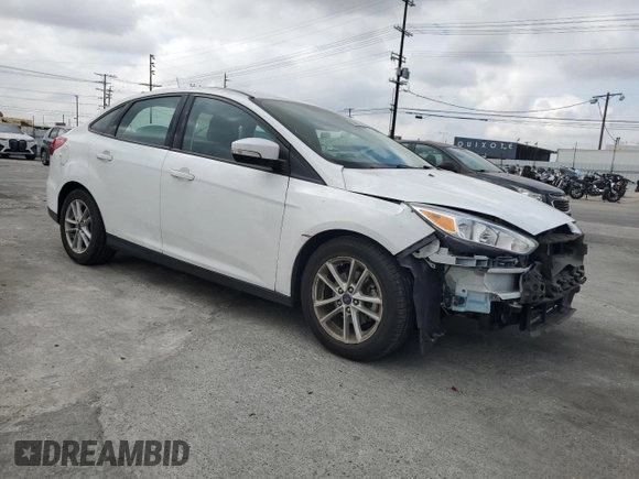 2017 Ford Focus SE with VIN 1FADP3F27HL217567, listed as a Copart auction lot 53749175 with 62,727 mi miles and Salvage title. Bid and sale history available at DreamBid. Image 4.