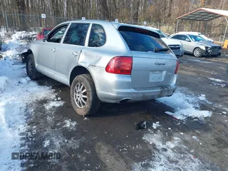 2005 Porsche Cayenne with VIN WP1AA29P75LA22059, listed as a IAAI auction lot 41250250 with 124,835 mi miles. Bid and sale history available at carsss.com. Image 3.