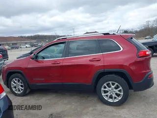 2015 Jeep Cherokee North with VIN 1C4PJMCS9FW674475, listed as a IAAI auction lot 41971771 with 186,376 mi miles. Bid and sale history available at carsss.com. Image 13.