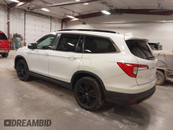 2021 Honda Pilot Special Edition with VIN 5FNYF6H2XMB054312, listed as a IAAI auction lot 41828508 with 115,652 mi miles and . Bid and sale history available at DreamBid. Image 3.