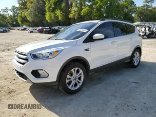 2018 Ford Escape SE with VIN 1FMCU0GD6JUA73082, listed as a Copart auction lot 50879005 with 148,900 mi miles and Salvage Title. Bid and sale history available at carsss.com. Image 1.
