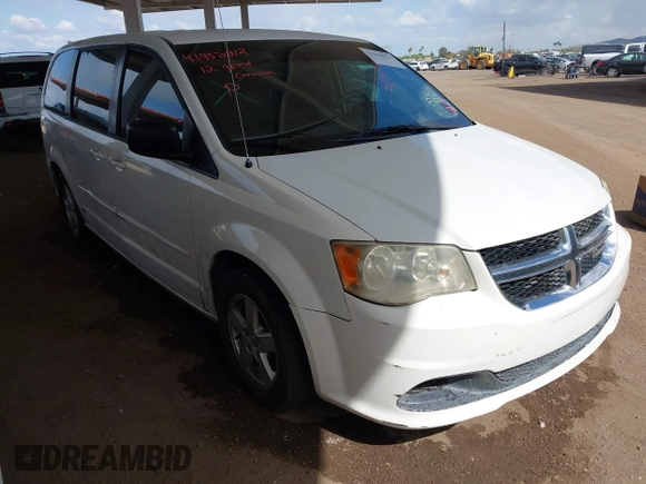 2012 Dodge Grand Caravan SE with VIN 2C4RDGBGXCR407641, listed as a IAAI auction lot 41950812 with 151,331 mi miles and . Bid and sale history available at DreamBid. Image 1.