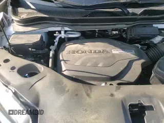 2020 Honda Pilot Touring 7-Passenger z VIN 5FNYF5H63LB011474, wystawiony jako Copart lot #62547135 z przebiegiem 100 676 mil mil oraz Szkoda całkowita • Salvage title. Historia ofert i sprzedaży dostępna na DreamBid. Obrazek 14.